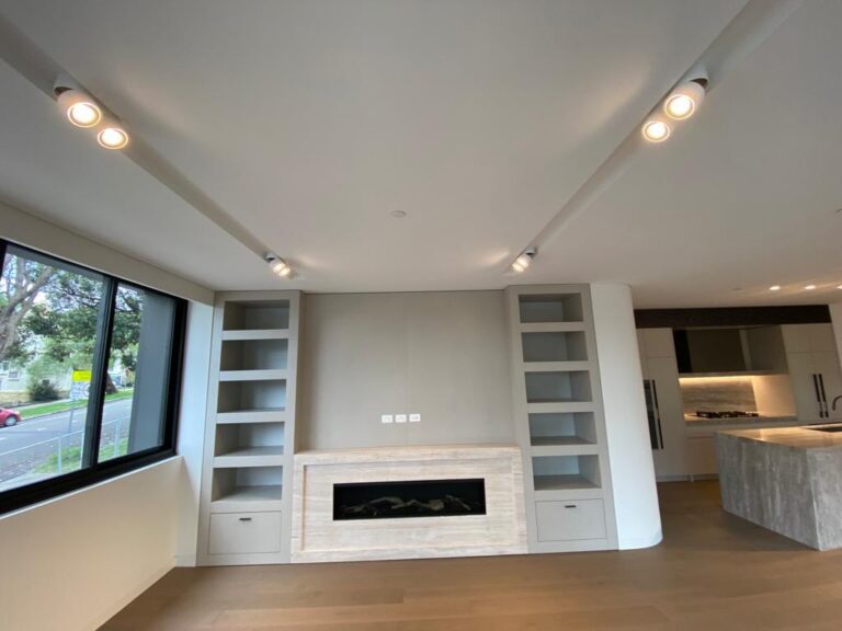 A TV room hall made perfect and adding beautiful with lighting installed by an expert electrician.